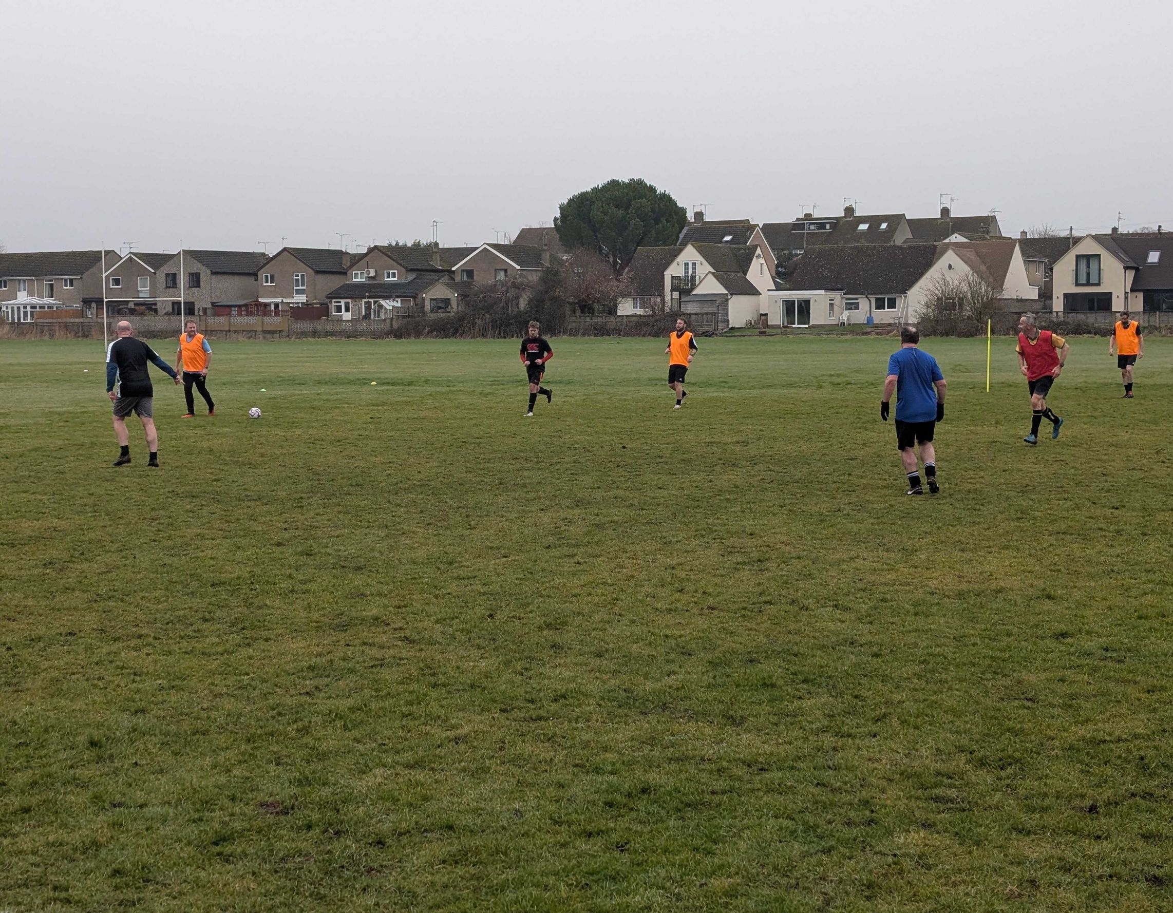 Player kicking up sand sliding into base